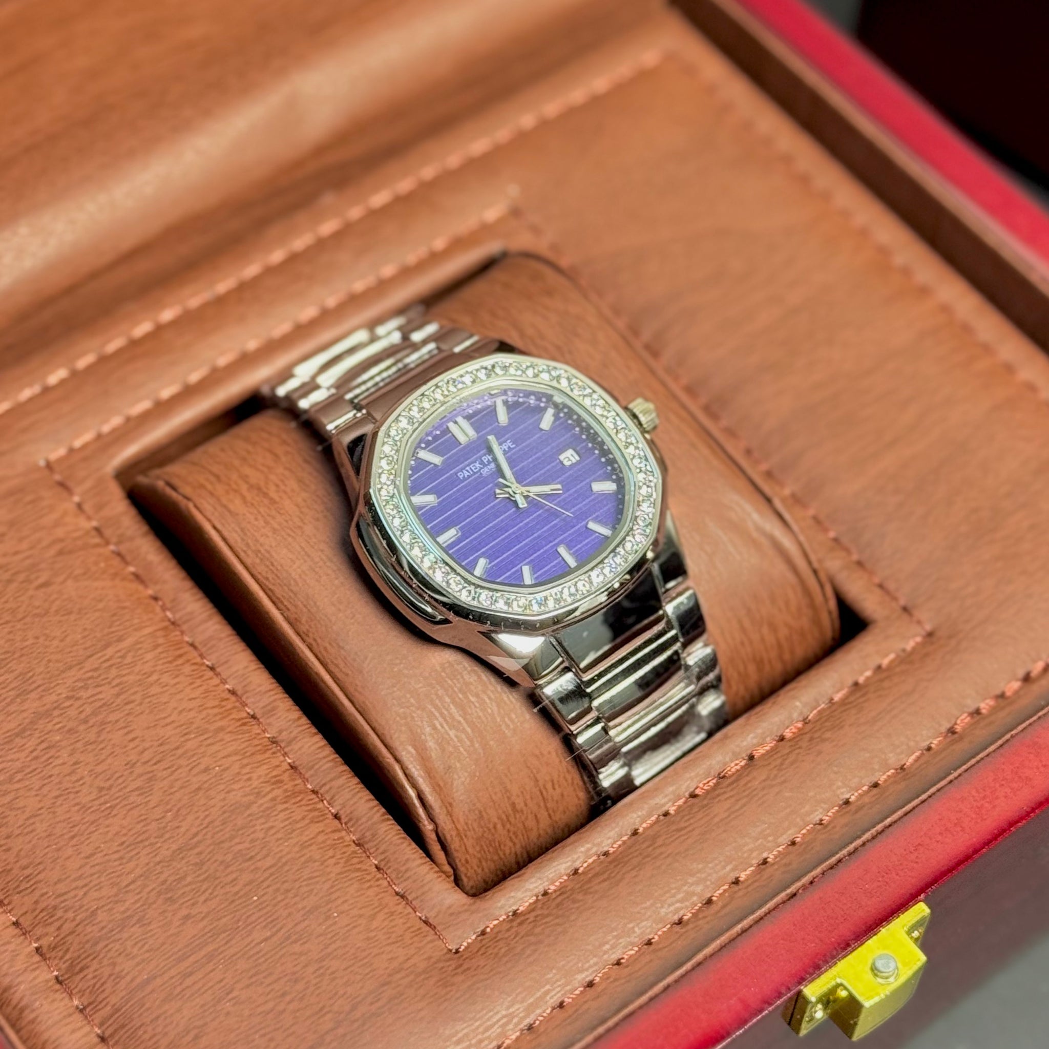 Wristive Patek Nautilus with Diamond-set Bezel Blue Dial with Date